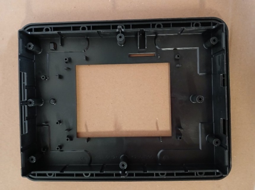 Moulded display bezel and front-panel frame