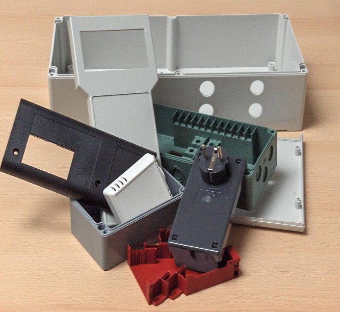 Injection-moulded junction boxes and technical components